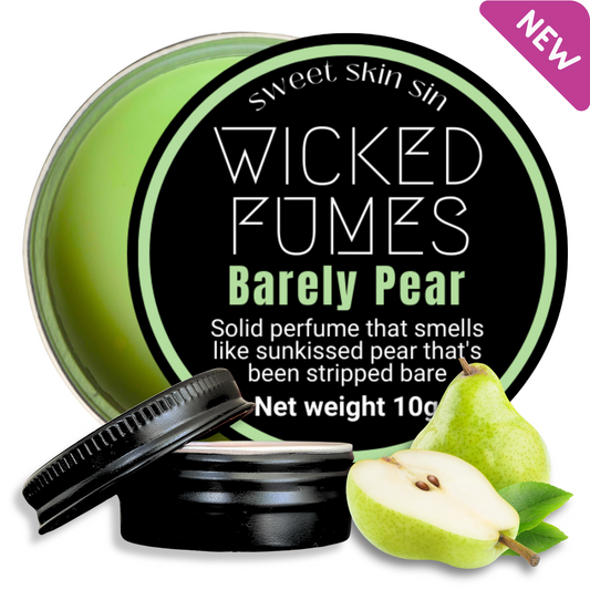 Picture of new Barely Pear solid perfume tin slightly opened with image of two pears leaning against tin