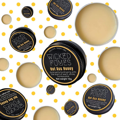 honey perfume collection spinning against a background of honey coloured polka dots